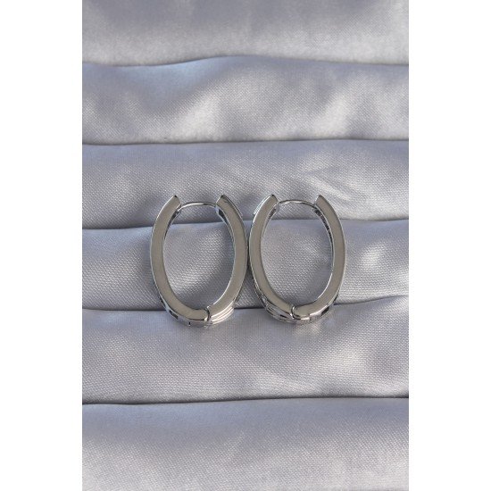 Pirinç Gümüş Renk Zirkon Taşlı Oval Model Küpe Pirinç Gümüş Renk Zirkon Taşlı Oval Model Küpe